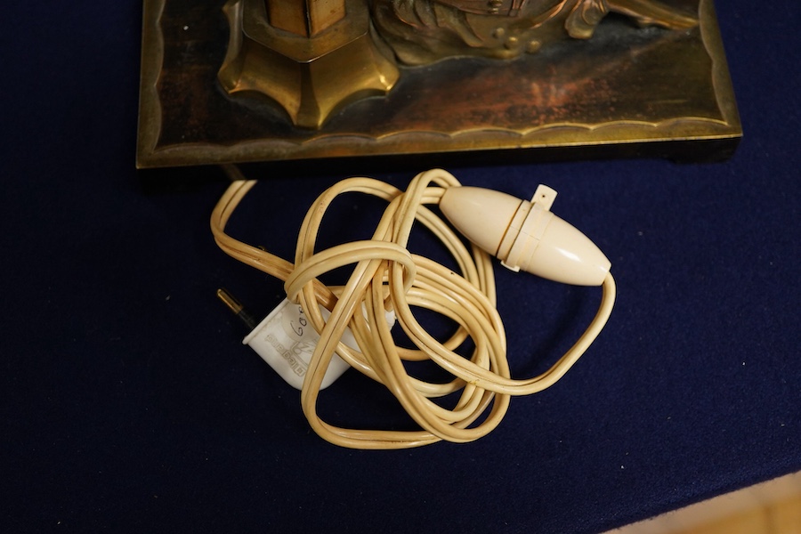 An Art Deco bronze table lamp, modelled with a seated woman holding a fan, 28cm high including shade